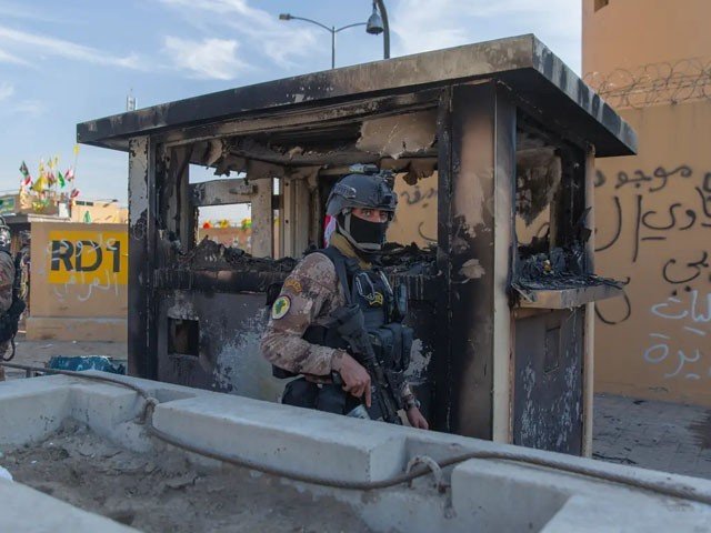 11 people killed in attack on a military checkpoint in Iraq